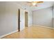 Bedroom with neutral walls, wood floors, closet access and natural light at 377 Ralph Mcgill Ne Blvd # C, Atlanta, GA 30312
