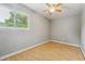 Bright bedroom with hardwood floors, ceiling fan, and a large window with natural light at 377 Ralph Mcgill Ne Blvd # C, Atlanta, GA 30312