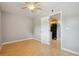 Cozy bedroom featuring a ceiling fan and light wood flooring, perfect for relaxation at 377 Ralph Mcgill Ne Blvd # C, Atlanta, GA 30312