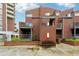 Exterior of brick townhouse with a garden, balcony and covered outdoor space at 377 Ralph Mcgill Ne Blvd # C, Atlanta, GA 30312