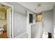Upstairs hallway with a closet, open railing and access to the bathroom at 377 Ralph Mcgill Ne Blvd # C, Atlanta, GA 30312