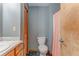 Bathroom with tile floors, granite countertops, and a shower curtain at 519 E Valley Ne Rd, Rydal, GA 30171