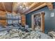 Cozy bedroom with wood paneling, ample closet space, and bunk beds at 519 E Valley Ne Rd, Rydal, GA 30171