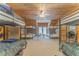 Spacious bedroom featuring multiple bunk beds and wood paneled ceiling and walls at 519 E Valley Ne Rd, Rydal, GA 30171