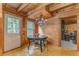 Dining area features wood floors and modern chandelier at 519 E Valley Ne Rd, Rydal, GA 30171