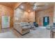 Relaxing living room featuring wood paneled walls, recessed lighting, comfortable seating, and carpet at 519 E Valley Ne Rd, Rydal, GA 30171