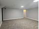 A finished basement featuring painted walls, and carpeted flooring at 8291 Highway 5, Whitesburg, GA 30185