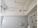 The bathroom shows a shower head, toilet, and tiled flooring at 8291 Highway 5, Whitesburg, GA 30185