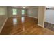 This spacious bedroom offers hardwood floors, two windows, and a walk-in closet at 8291 Highway 5, Whitesburg, GA 30185