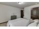 Bright bedroom with fresh linens, clean lines, and easy access to the home at 893 Whitfield Oak Rd, Auburn, GA 30011