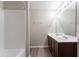 This bathroom has a double sink vanity with a full mirror, shower and tub at 12039 Quail Dr, Hampton, GA 30228