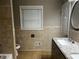 Bathroom features a double sink vanity with granite counters and tile flooring at 2436 Glenrock Dr, Decatur, GA 30032