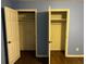 Bedroom featuring hardwood floors and open closet space at 2436 Glenrock Dr, Decatur, GA 30032