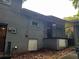 Back of the house with multiple doors and a stairway visible at 2436 Glenrock Dr, Decatur, GA 30032