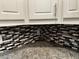 Kitchen with granite counter tops and mosaic tile backsplash at 2436 Glenrock Dr, Decatur, GA 30032
