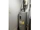 This is a water heater with visible connections and attached documents at 2436 Glenrock Dr, Decatur, GA 30032