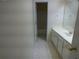 Bathroom features a vanity and tile flooring at 4576 Creek Forestt Trl, Lilburn, GA 30047