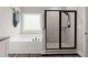 Bathroom with soaking tub, glass shower, and a modern design for a luxurious experience at 65 Harmony Woods Ln, Dallas, GA 30157