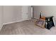 Spacious bonus room features carpet flooring and neutral walls, awaiting personalization at 65 Harmony Woods Ln, Dallas, GA 30157