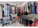 Spacious walk-in closet with shelving, racks, and organizers for maximizing storage at 65 Harmony Woods Ln, Dallas, GA 30157