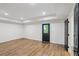 Finished basement features wood floors, recessed lighting, and an exterior door at 1916 River Birch Ln, Atlanta, GA 30316