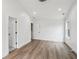 Bright bedroom features wood floors, neutral walls, and access to the bathroom at 1916 River Birch Ln, Atlanta, GA 30316