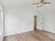 Clean empty bedroom featuring wood-look floors and natural light at 1916 River Birch Ln, Atlanta, GA 30316