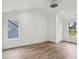 Bright bedroom with wood floors, neutral walls, and a ceiling fan at 1916 River Birch Ln, Atlanta, GA 30316