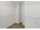 Walk-in closet with custom shelving for ample storage at 1916 River Birch Ln, Atlanta, GA 30316
