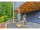 Backyard view showing a lovely porch, providing an intimate outdoor seating area at 1916 River Birch Ln, Atlanta, GA 30316