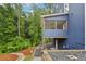 Charming home exterior featuring a lovely screened porch, seamlessly blending indoor/outdoor living at 1916 River Birch Ln, Atlanta, GA 30316