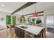 Spacious kitchen island overlooks dining area and living room, with lush outdoor view at 1916 River Birch Ln, Atlanta, GA 30316