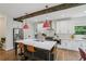 Eat-in kitchen featuring a large island with seating, stainless appliances, and modern cabinetry at 1916 River Birch Ln, Atlanta, GA 30316