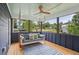 Relaxing screened porch with a comfortable swing and scenic outdoor views at 1916 River Birch Ln, Atlanta, GA 30316