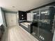Modern bathroom boasts a separate glass enclosed shower, soaking tub, and double door closet at 2030 Hydrangea Ln, Austell, GA 30106