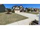 Traditional two-story brick home with a two-car garage and a well-manicured front yard on a sunny day at 2030 Hydrangea Ln, Austell, GA 30106