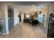Open-concept kitchen with stainless steel appliances, gray cabinets, and a breakfast bar, ideal for modern living at 2030 Hydrangea Ln, Austell, GA 30106