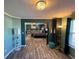 An expansive primary bedroom with decorative lighting, plush decor, and seamless design elements at 2030 Hydrangea Ln, Austell, GA 30106