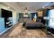Bright primary bedroom with custom decor, tray ceiling, and thoughtful touches at 2030 Hydrangea Ln, Austell, GA 30106