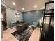 Home office with accent wall, a modern desk, and stylish furnishings, perfect for a productive work environment at 2030 Hydrangea Ln, Austell, GA 30106