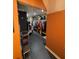 Large walk-in closet featuring custom storage solutions and an adjacent sitting area at 2030 Hydrangea Ln, Austell, GA 30106