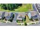 Aerial shot of well-maintained homes with manicured lawns and mature trees in a neighborhood at 3621 Portland Trail Dr, Suwanee, GA 30024