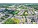 Aerial shot of a neighborhood showing the house surrounded by greenery and community amenities at 3621 Portland Trail Dr, Suwanee, GA 30024