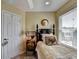 Cozy bedroom featuring a bed, window, and natural light at 3621 Portland Trail Dr, Suwanee, GA 30024