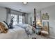 Stylish bedroom featuring bright windows and beautifully decorated furnishings at 3621 Portland Trail Dr, Suwanee, GA 30024