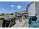 Outdoor deck with seating, covered grill, and views of the neighborhood at 3621 Portland Trail Dr, Suwanee, GA 30024
