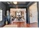 Elegant dining room with hardwood floors and stylish decor, perfect for entertaining at 3621 Portland Trail Dr, Suwanee, GA 30024