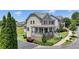 Charming two-story home with stone accents, landscaped front yard, and inviting covered porch at 3621 Portland Trail Dr, Suwanee, GA 30024