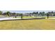Scenic park view showcasing pedestrian bridge and manicured green spaces for recreation at 3621 Portland Trail Dr, Suwanee, GA 30024