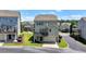 View of the rear exterior of the house with a balcony and a garage at 3621 Portland Trail Dr, Suwanee, GA 30024